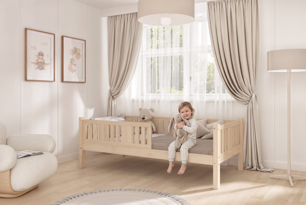 Kind im Kinderbett NIKO